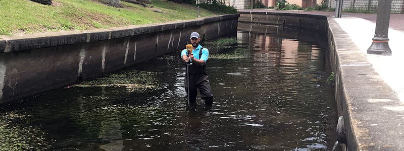 man using the flowtracker2 acoustic doppler velocimeter in florida